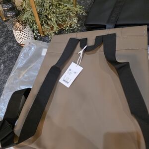 NWT MEN/WOMEN RAINS MESSENGER BACKPACK IM COLOR WOOD.  WATER PROOF.